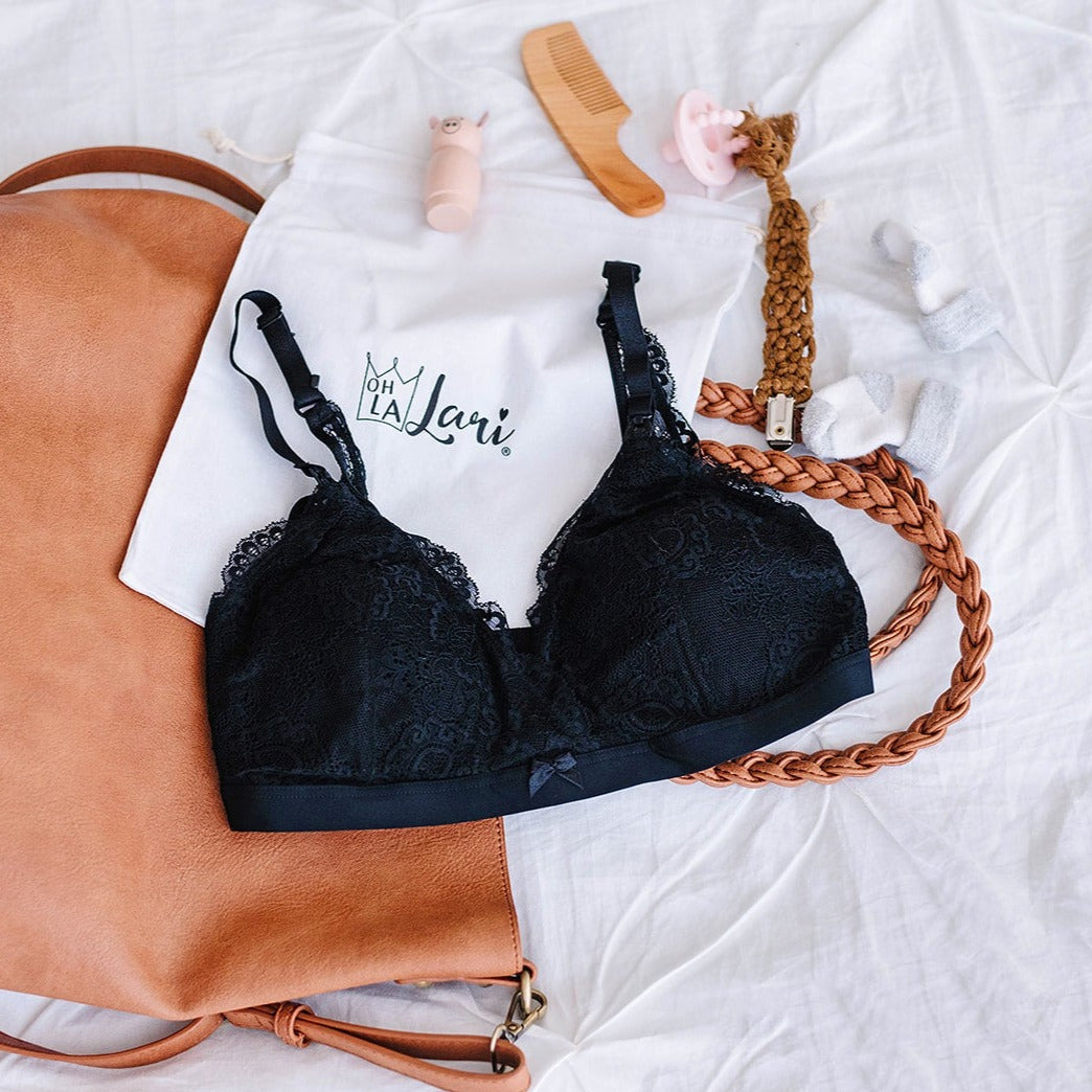 black lace nursing bra with diaper bag flatlay