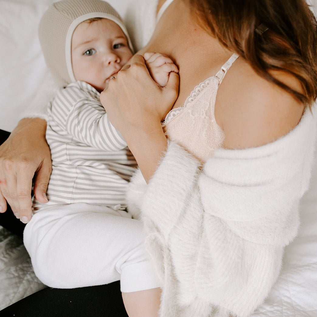 mom nursing baby oh la lari nude bra